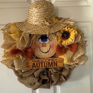 A not scary at all scarecrow wreath on a 14” wreath form. She’s so cute.
